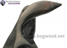 Salmon of Knowledge in bog oak by Michael Casey