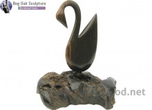 Bog oak swan by Michael Casey