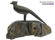 Pheasant in bog oak by Michael Casey