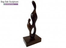 Mother and Child in bog oak by Michael Casey