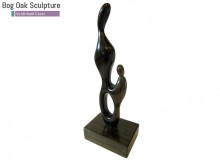 Mother and Child in bog oak by Michael Casey
