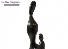 Mother and Child in bog oak by Michael Casey